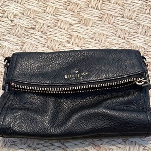 Early 2000s era black leather Kate Spade crossbody purse. Mint condition.